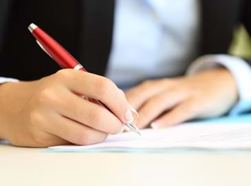 Businessman writing an article