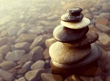 A stack of stones in a river